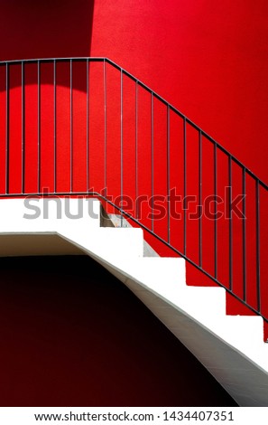 architecture details, red wall, stairs and railings