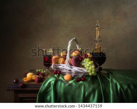 Still life with fruits and red wine