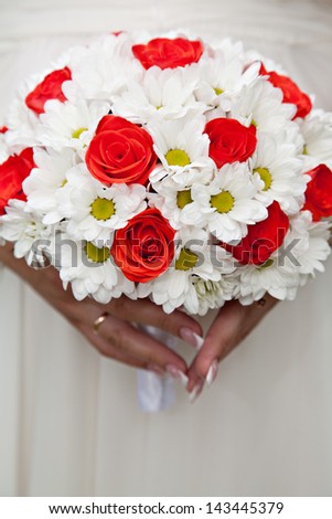 Wedding bouquet with red roses