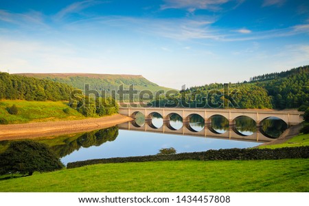 Ladybower Reservoir, Peak District, Derbyshire, UK. The bridge across the Ladybower reservoir taken on a sunny day during the summer. Royalty-Free Stock Photo #1434457808