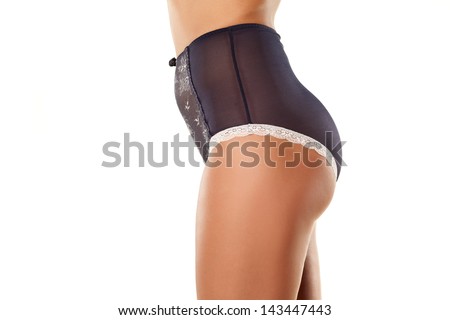 view from the side of a woman's hips and panties with high waist Royalty-Free Stock Photo #143447443