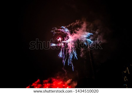 Colorful fireworks on the black sky background in Tivoli, Copenhagen