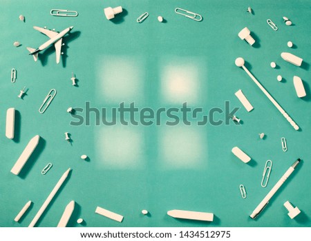 White stationary and education supplies on blue background with negative space. Flat lay. Old-fashioned style. Back to school background.