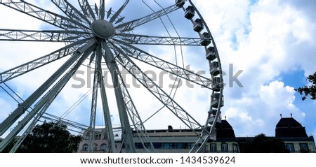 Budapest Eye ferris-wheel or big wheel in Budapest, Hungary, Europe on a cloudy summer day