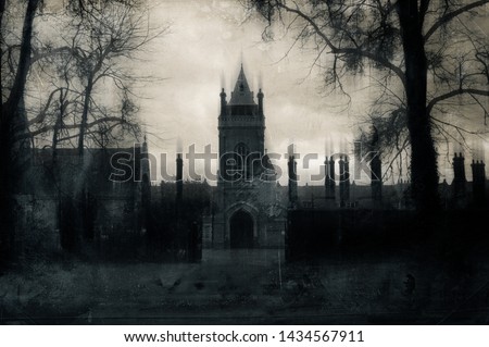 A sinister old Victorian building with tower on a winters day. With a gothic, aged grunge edit. Royalty-Free Stock Photo #1434567911