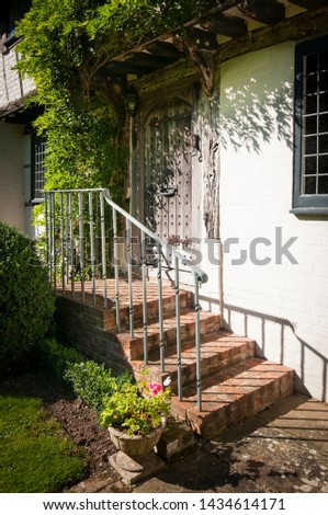 Steps leading up to a medieval hall house.