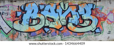 Fragment of colored street art graffiti paintings with contours and shading close up Royalty-Free Stock Photo #1434664409