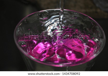 This picture is about water with a really nice purple color in the water