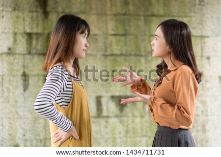 two women having conflict, arguing each other Royalty-Free Stock Photo #1434711731