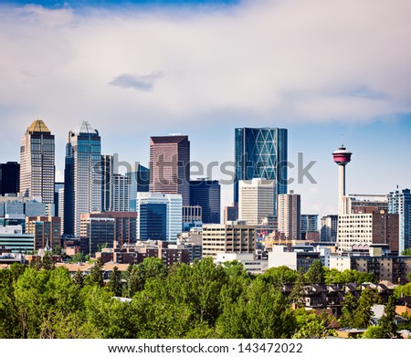 Modern North American Downtown.Alberta's Oil and Gas engine-Calgary.Picture taken while downtown is being flooded by a major storm in it's history.Copy space intentionally left above the city skyline.