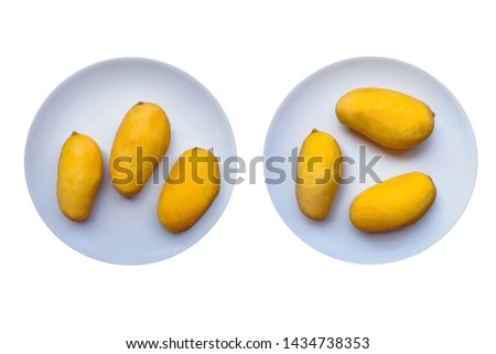 Set of Three Yellow Mango that served on the plate isolated on a white background  