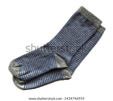 Isolated textured striped pattern gray and blue color stripes pair of two cotton material sock socks laying laid flat on white clear solid background surface 