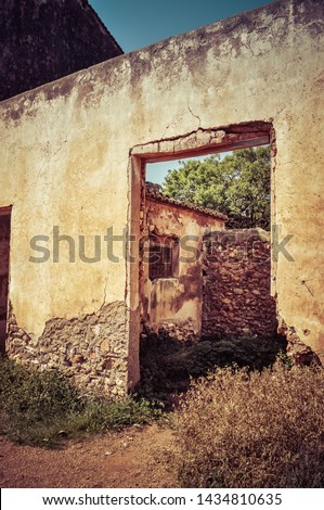 hollow of the door in ruined farmhouse