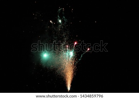Sparking firework on black background