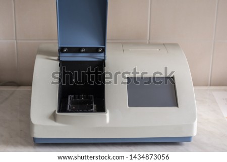 Universal electrical instrument spectrophotometer. Widespread use in the areas of: chemistry, energy, ecology, water supply and other areas of industry. Royalty-Free Stock Photo #1434873056