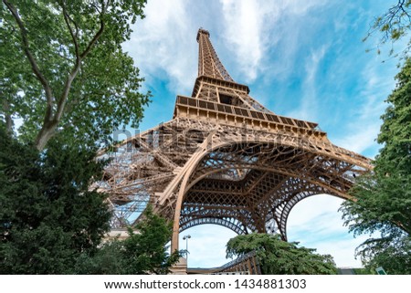 Famous sightseeing of Paris Eiffel Tower, France with natural tree frame