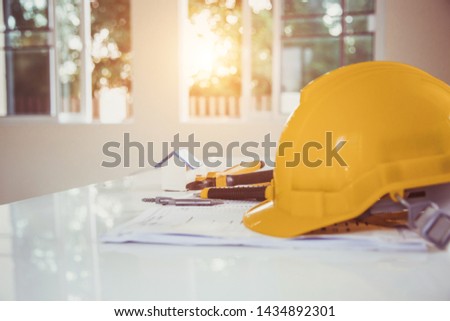 Architectural and Engineer Office desk background construction project ideas concept, with drawing equipment
