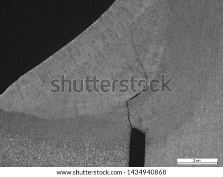 Caustic stress cracking of 3” A105/106 carbon steel pipe spool weld removed from steam line. Etched with 2% Nital Royalty-Free Stock Photo #1434940868
