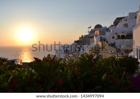 Santorini,Greece. Pictures view of traditional cycladic Santorini houses. Sunset view, Location: Oia village, Santorini, Greece. Vacations background.
