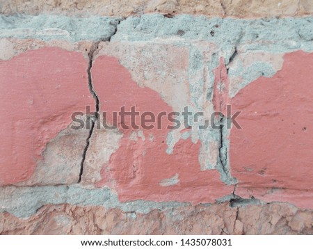 wall of the house in the cracks