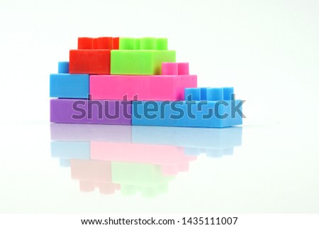 Toy building block bricks on a white background