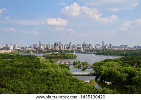 Chinese city Changchun Skyline, grant park in a city, Nanhu park Royalty-Free Stock Photo #1435130420