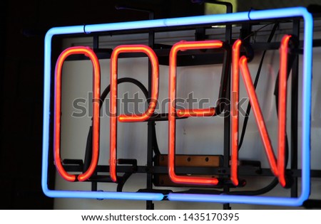 Colorful open character neon sign
                               