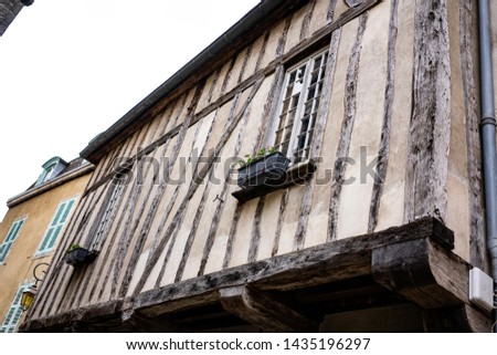 Beautiful and historical houses in the center of small vine town Nolay in Burgundy in France, old vintage look buildings creating cozy atmosphere, pictures taken during bike trip around vineyards