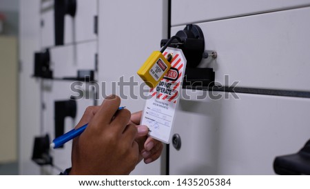 Lock out & Tag out, Lock out station, machine - specific Lock out devices , Lock out for electrical maintenance Royalty-Free Stock Photo #1435205384