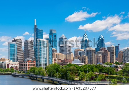 Philadelphia downtown skyline with blue sky and white cloud Royalty-Free Stock Photo #1435207577