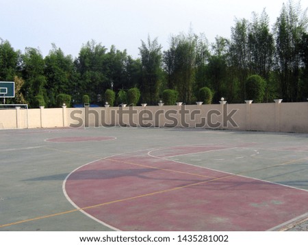 Basketball Yard Sorrounded The Green tree