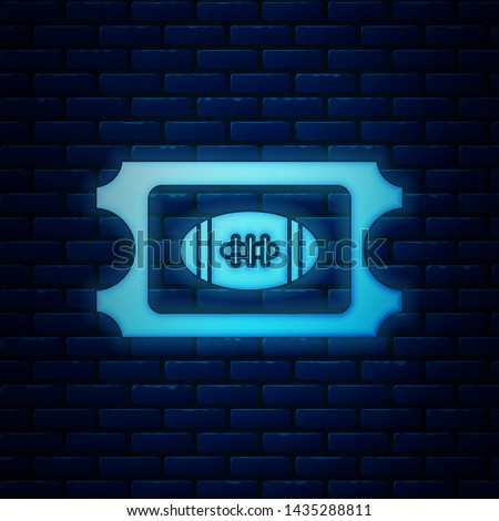 Glowing neon American Football ticket icon isolated on brick wall background.  Vector Illustration