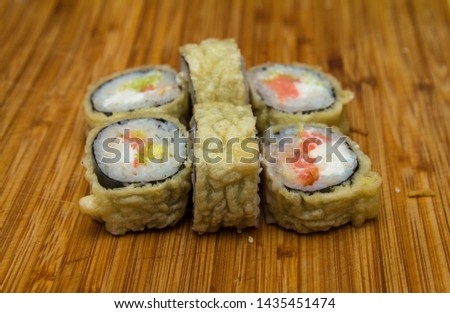 Sushi on a wooden tray. Japanese sushi.