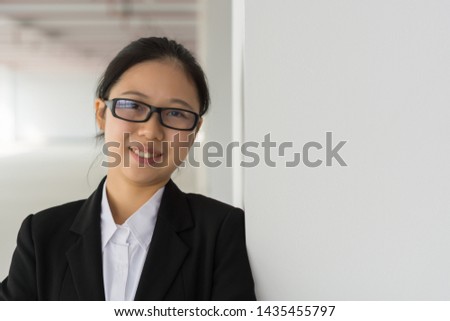 Modern business woman in the office with copy space