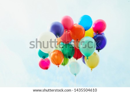 image of colorful balloons with sky background