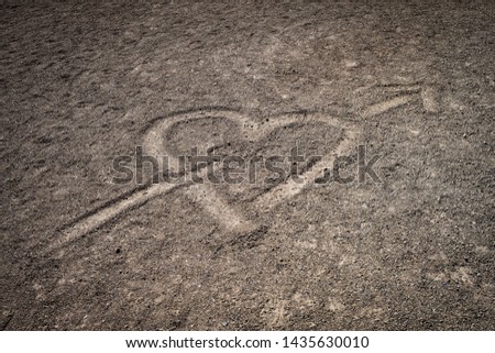 A love heart drawn in the volcanic sand of the mount Teide highland plain