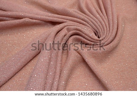 Linen fabric with synthetics. Color red and white. Texture, background, pattern, sequins, mesh.