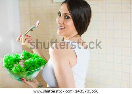 Break for energy, vitamins and refreshness. Close up  photo of lady, eating healthy salad  - Stock image