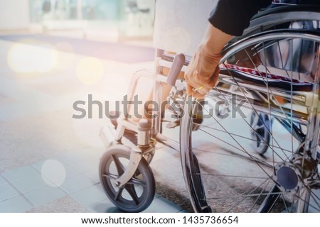 Close up of woman who use a wheelchair at the hospital with copy space Royalty-Free Stock Photo #1435736654
