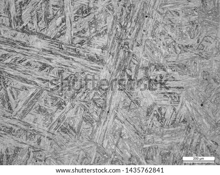Tempered martensite microstructure of CA6NM iron chromium nickel molybdenum alloy sample.  Royalty-Free Stock Photo #1435762841