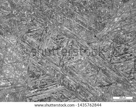 Tempered martensite microstructure of CA6NM iron chromium nickel molybdenum alloy sample.  Royalty-Free Stock Photo #1435762844