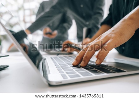 Business people analyzing investment graph meeting brainstorming and discussing plan in meeting room, investment concept Royalty-Free Stock Photo #1435765811