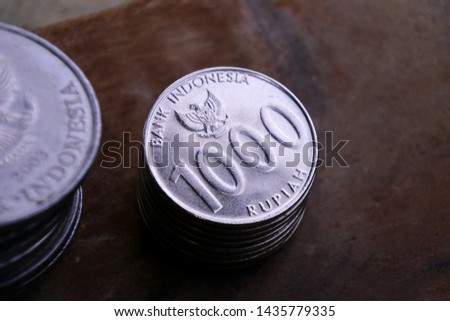 Indonesian coins with Rp.5000 and Rp.1000  denominations