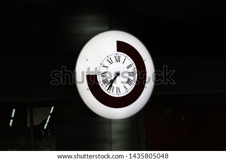 
Clock of a commuter train station of Madrid, Spain
