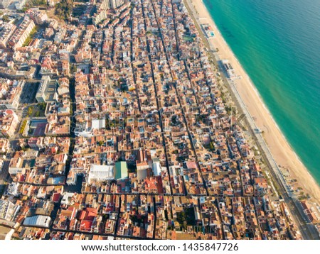 Aerial view of seaside area of Badalona on sunny winter day, Catalonia, Spain

 Royalty-Free Stock Photo #1435847726