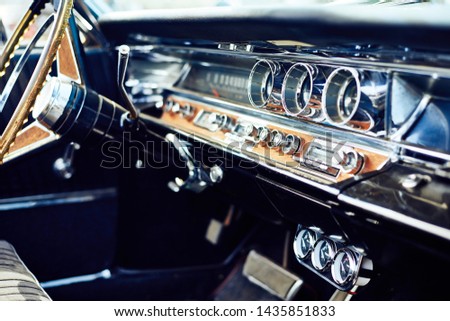 Dashboard of a classic american car from the 1960's. Royalty-Free Stock Photo #1435851833