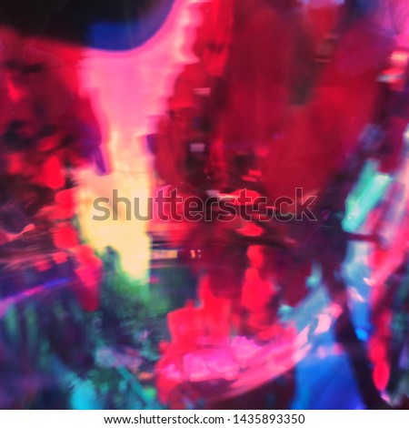 Color blurred background. Reflection of colored glass. Image for design, art projects, posters and wallpaper.