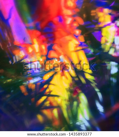 Color blurred background. Reflection of colored glass. Image for design, art projects, posters and wallpaper.
