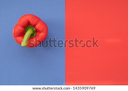 Collage made out of red pepper and color background. Flat lay. Minimal concept. Trendy colorful photo. Minimal style with colorful paper backdrop. Flat lay fashion concept: pepper on pastel background