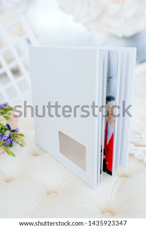 Wedding photobook for several pages, top view